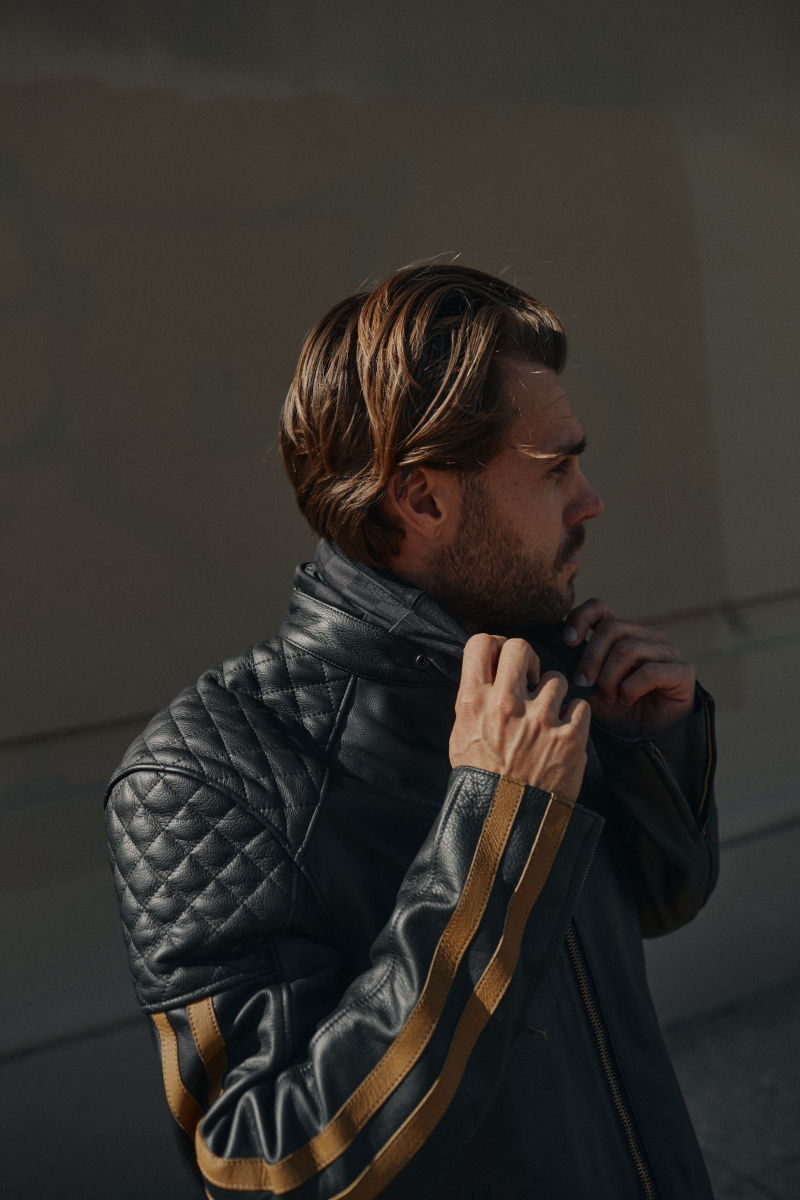 Black leather jacket with gold discount
