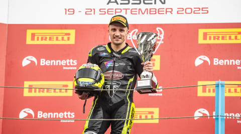 Luke Stapleford holding trophy at the Macadam Racing