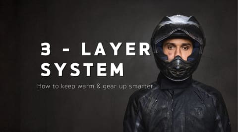 3 Layer System Banner- How to keep warm and gear up smarter - title with motorcyclist in helmet and Triumph winter gear