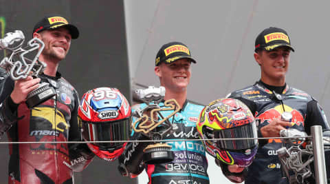 Daniel Holgado took his maiden Moto2™ victory today at the Grand Prix of Catalonia in a decisive lights-to-flag victory from pole position.  The Moto3 graduate had already climbed onto the podium at the Austrian Grand Prix, but this weekend went one better. Using his Triumph 765cc triple power to the absolute maximum around the fast and flowing 4.66km Circuit de Barcelona Catalunya, Holgado took pole position by just 0.08seconds from Jake Dixon, but his race was a different story.   Resisting pressure early on, he soon established a pace no one could match as they became embroiled in their own battles and scampered clear to win by a margin of 2.5seconds.  Jake Dixon fought long and hard to secure second position at the flag, and Daniel Muñoz hauled himself from sixth on the grid to take the final step of the podium - his first Moto2 podium - just 0.6seconds adrift. Manuel Gonzalez was the most notable climber, ascending from 12th on the grid to finish fourth.  Meanwhile, championship contender Aron Canet crashed out of the race and Diogo Moreira was unable to replicate his recent form and came home 14th. That means that at the front of the championship standings, Manuel Gonzalez has extended his lead to 217 points, ahead of Canet on 179, 38 points adrift, and Moreira on 175. Holgado has climbed to seventh overall.   Holgado’s victory means that there have been two rookie winners in the last two races now, with David Alonso taking his maiden Triumph-powered Moto2 win in Hungary.  There’s no rest for the Moto2 field as they head straight to San Marino, Italy, for round 16 on 12-14 September, before embarking on the overseas leg as the season starts to near its crescendo.   ---  Triumph Triple Trophy Shortlist:   1. Daniel Holgado - for achieving his maiden Moto2 victory and in such dominant fashion   2. Manuel Gonzalez - for climbing from 12th to 4th to extend his championship lead   3. Jake Dixon - for a determined ride to hold onto second position    Look out for Instagram stories on MotoGP’s official account @motogp to vote for your favourite rider and enter the prize draw here, to win your own Triumph Triple Trophy Street Triple 765 RS.  ---  Next round:  Round 16, Misano World Circuit Marco Simoncelli, Italy, 12-14 September 2025