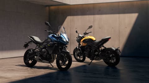 Triumph Trident 660 in Cosmic Yellow and Triumph Tiger Sport 660 in Interstellar Blue parked