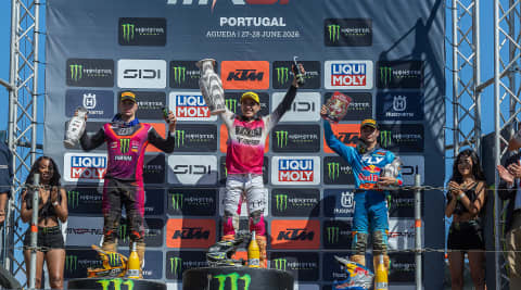 Guillem Farres at MXGP Portugal holding trophy in the air