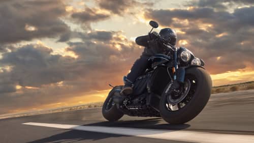 Triumph Rocket 3 Storm cornering at sunset