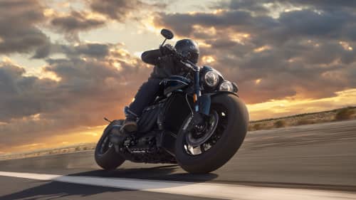 Triumph Rocket 3 Storm cornering at sunset