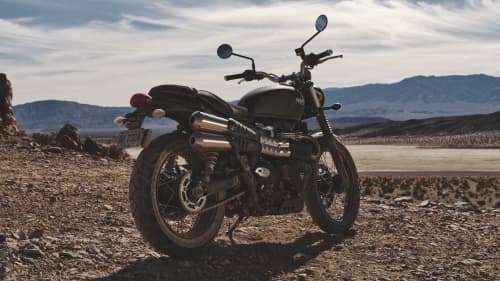 Stationary angled side view of Triumph Scrambler 900
