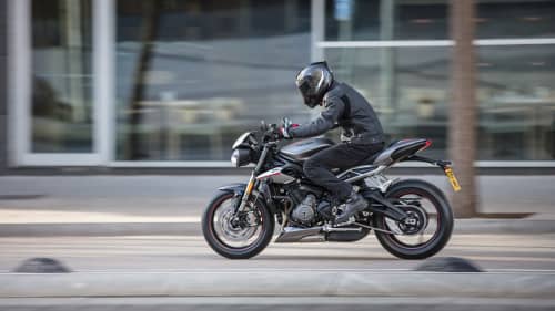 Triumph Street Triple RS riding through city