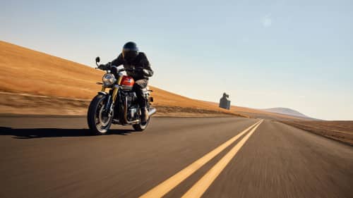 Triumph Speed Twin 1200 RS riding shot on the road 