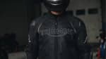 Triumph Motorcycles Black Triple Sports Mesh Riding Jacket with large Triumph logo on chest. D3O Armour.