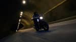 Triumph Speed Twin 900 riding shot through a tunnel