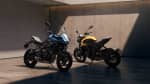 Triumph Trident 660 in Cosmic Yellow and Triumph Tiger Sport 660 in Interstellar Blue parked