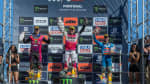 Guillem Farres at MXGP Portugal holding trophy in the air
