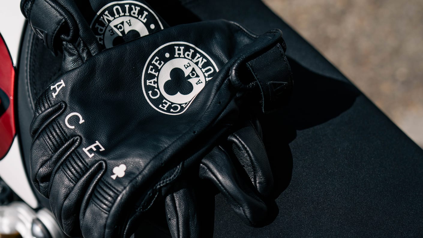 Triumph Clothing X Ace Cafe Riding Gloves on seat