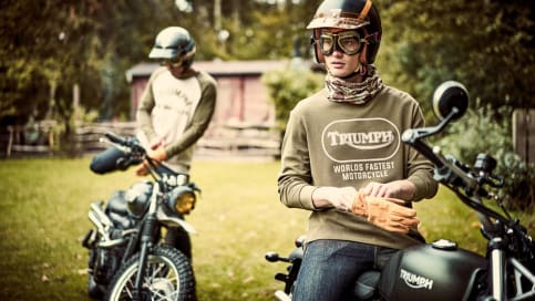 Two guys on motorcycles wearing the new Autumn Winter 23 Triumph Lifestyle clothing collection