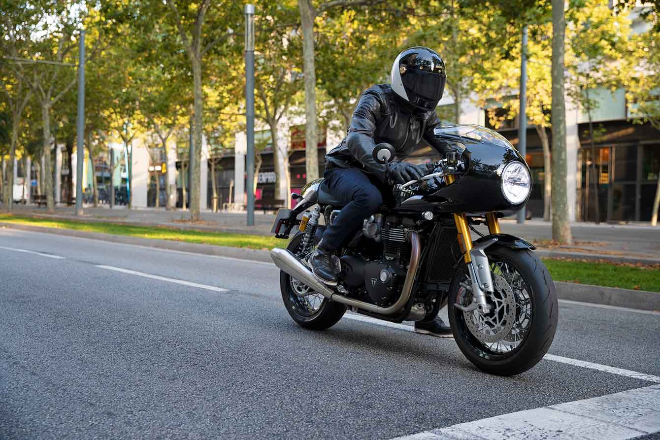 A Supreme suitcase used as motorcycle seat