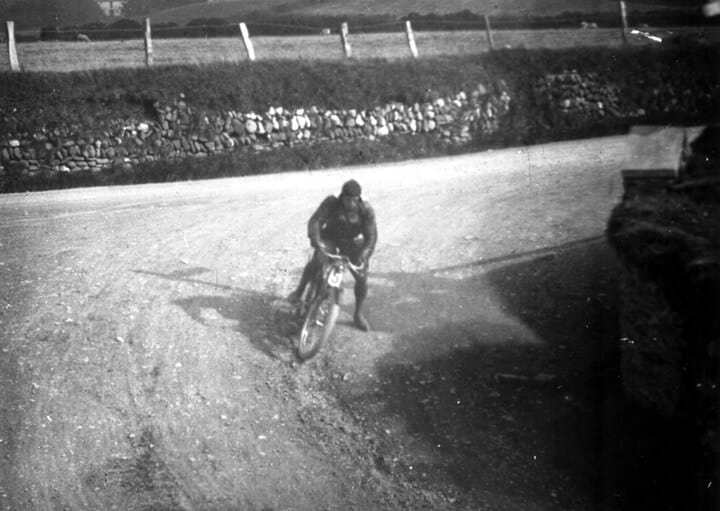 Historic rider on a dirt track