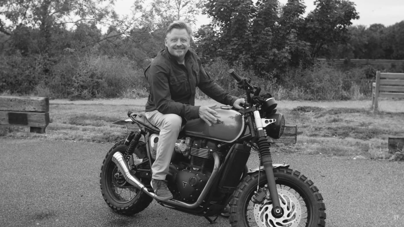 Black & white shot of Charlie Boorman on his Triumph motorcycle ready for The Distinguished Gentleman's Ride