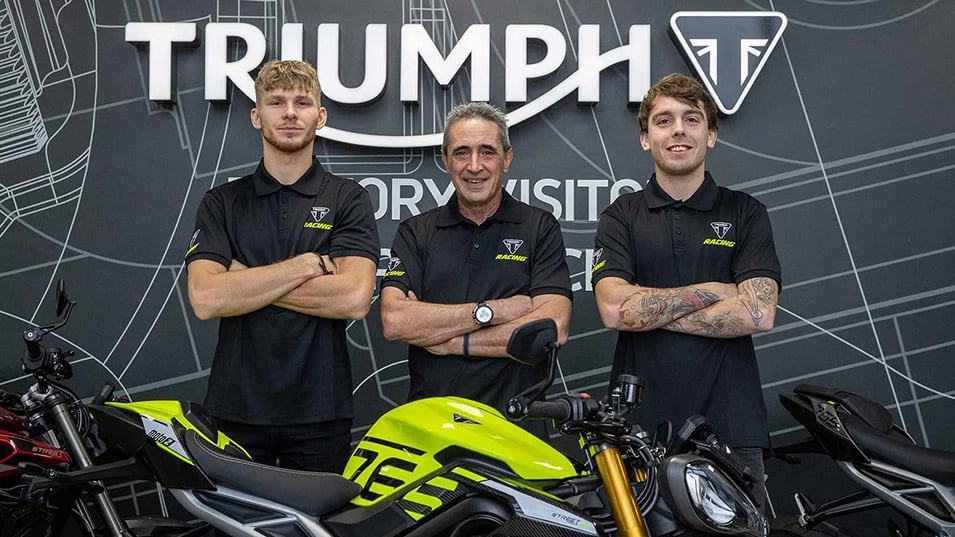 PTR Triumph Team manager Simon Buckmaster with the two riders