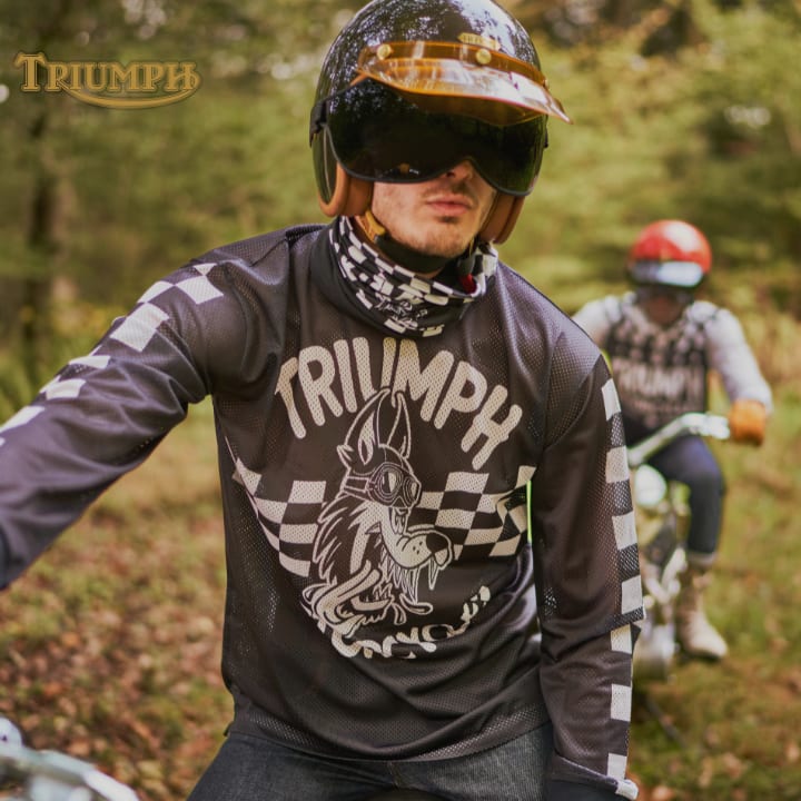 Model wearing Triumph's Stalker Heritage Racing Top