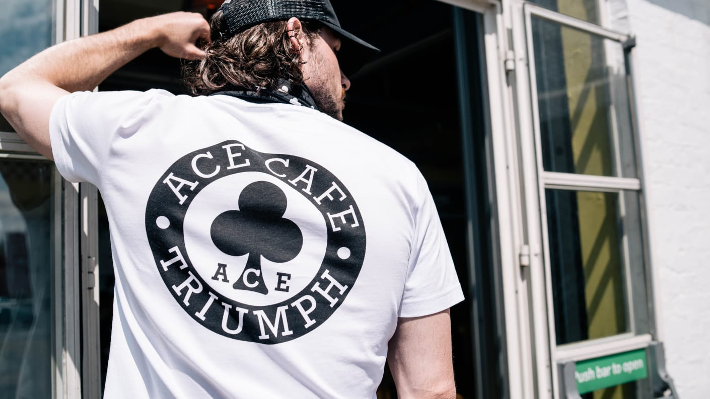 Man wearing Ace Cafe Triumph White T-shirt