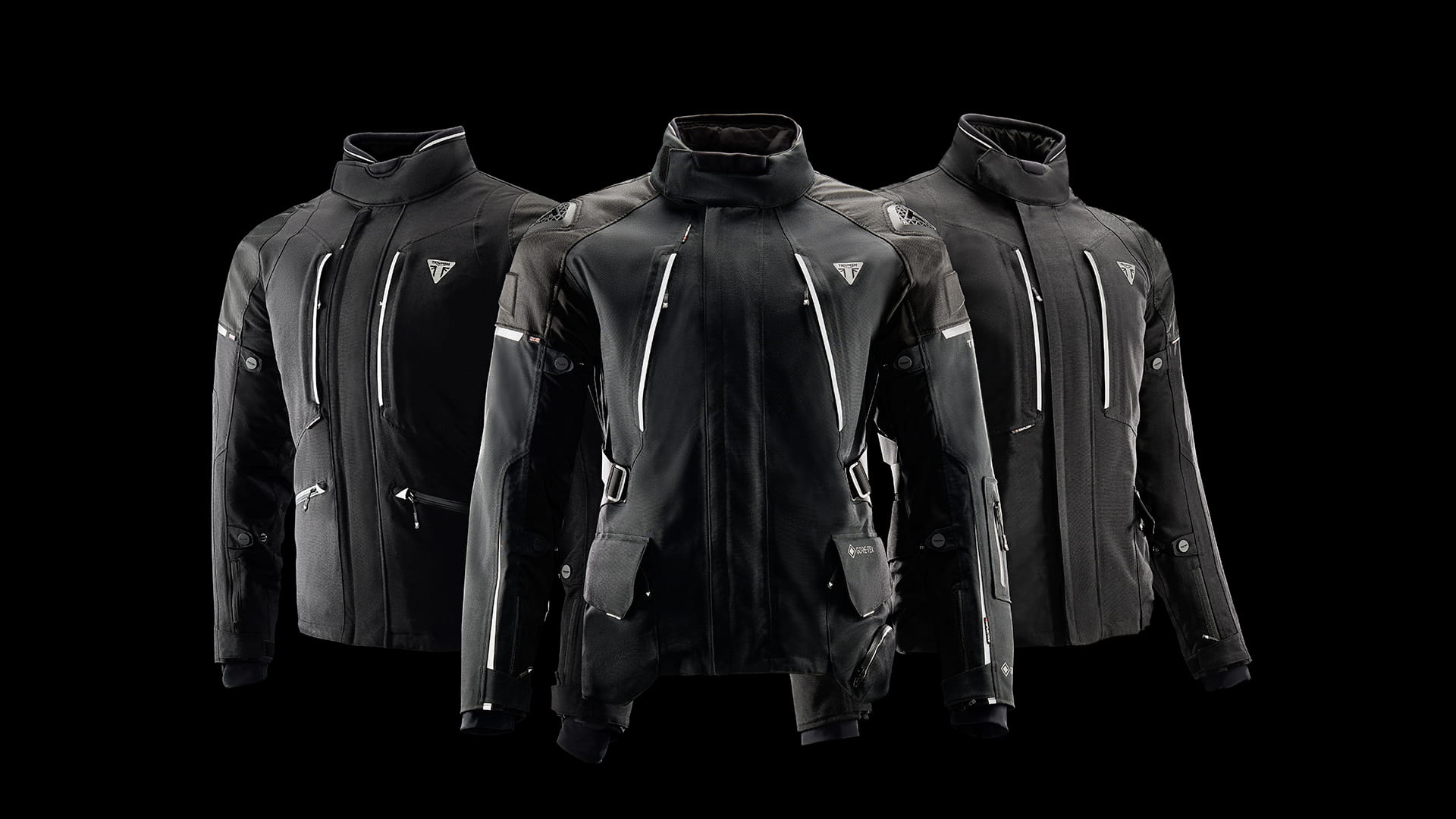 Triumph Motorcycles Clothing Adventure Touring Affix Series Jacket Group Shot on Black Background