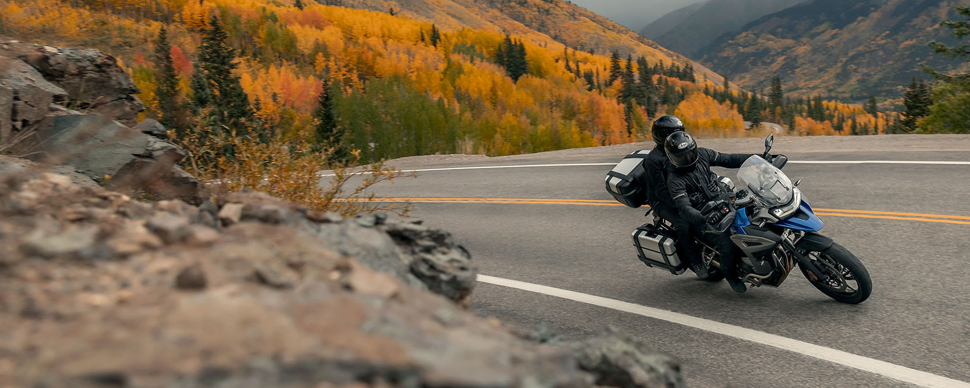 Tiger 1200 GT Explorer riding on road)