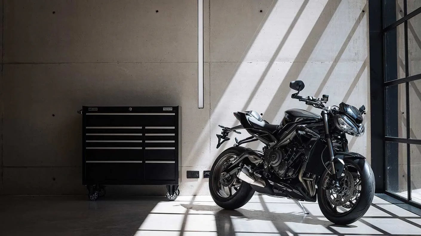 Triumph Street Triple RS parked up in a garage