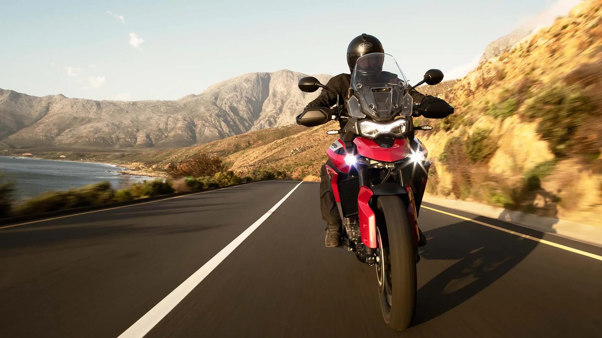 Triumph Tiger 900 GT Pro in Korosi Red powering down South Africa's roads