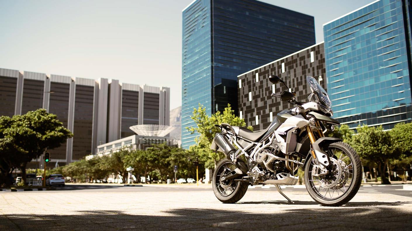 Static shot of Triumph Tiger 900 Rally Pro in city landscape