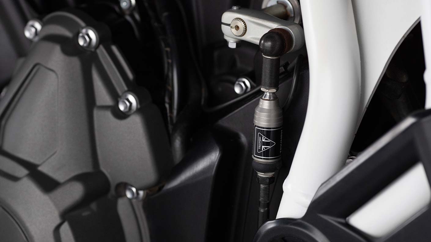 Close-up of the Tiger 900 Rally Pro's Triumph shift assist quickshifter