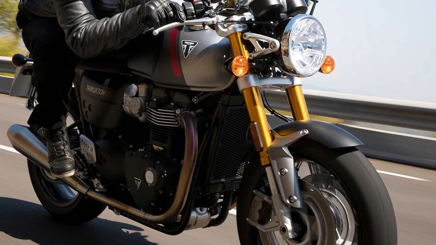 Close-up shot of the Triumph Thruxton RS's premium Showa USD forks