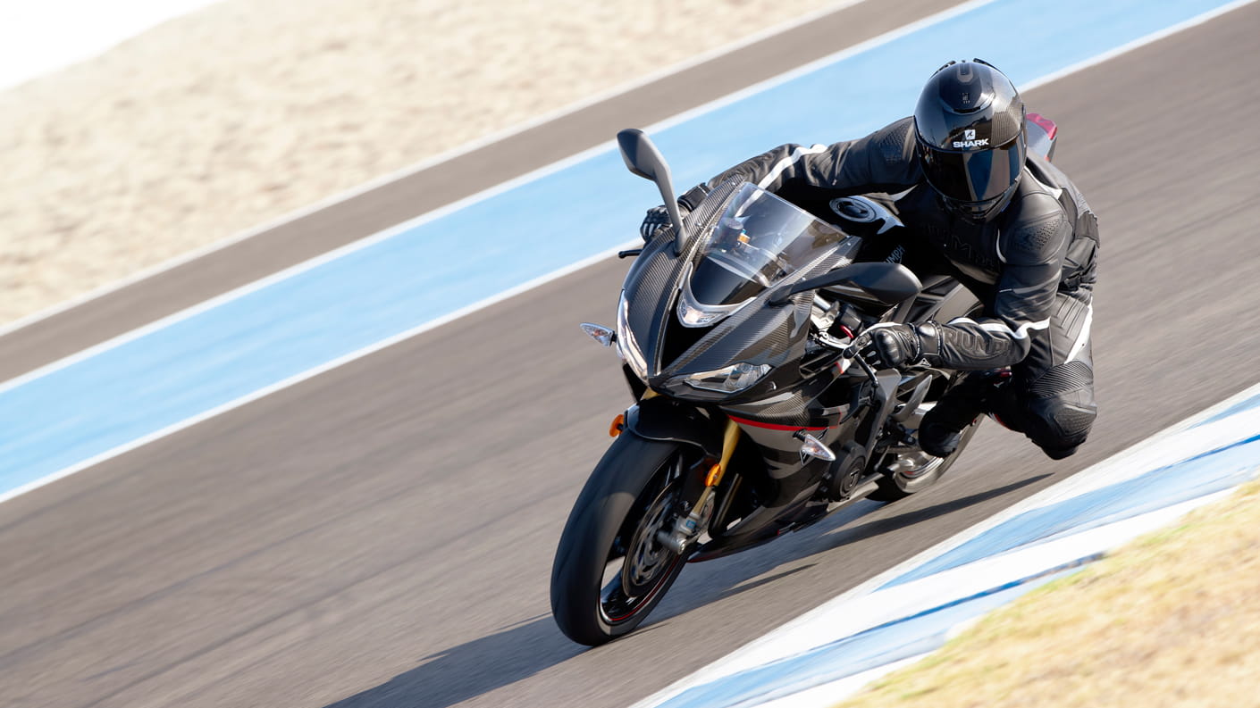 Triumph Daytona Moto2TM 765 motorcycle (USA Edition) riding around the race track at speed