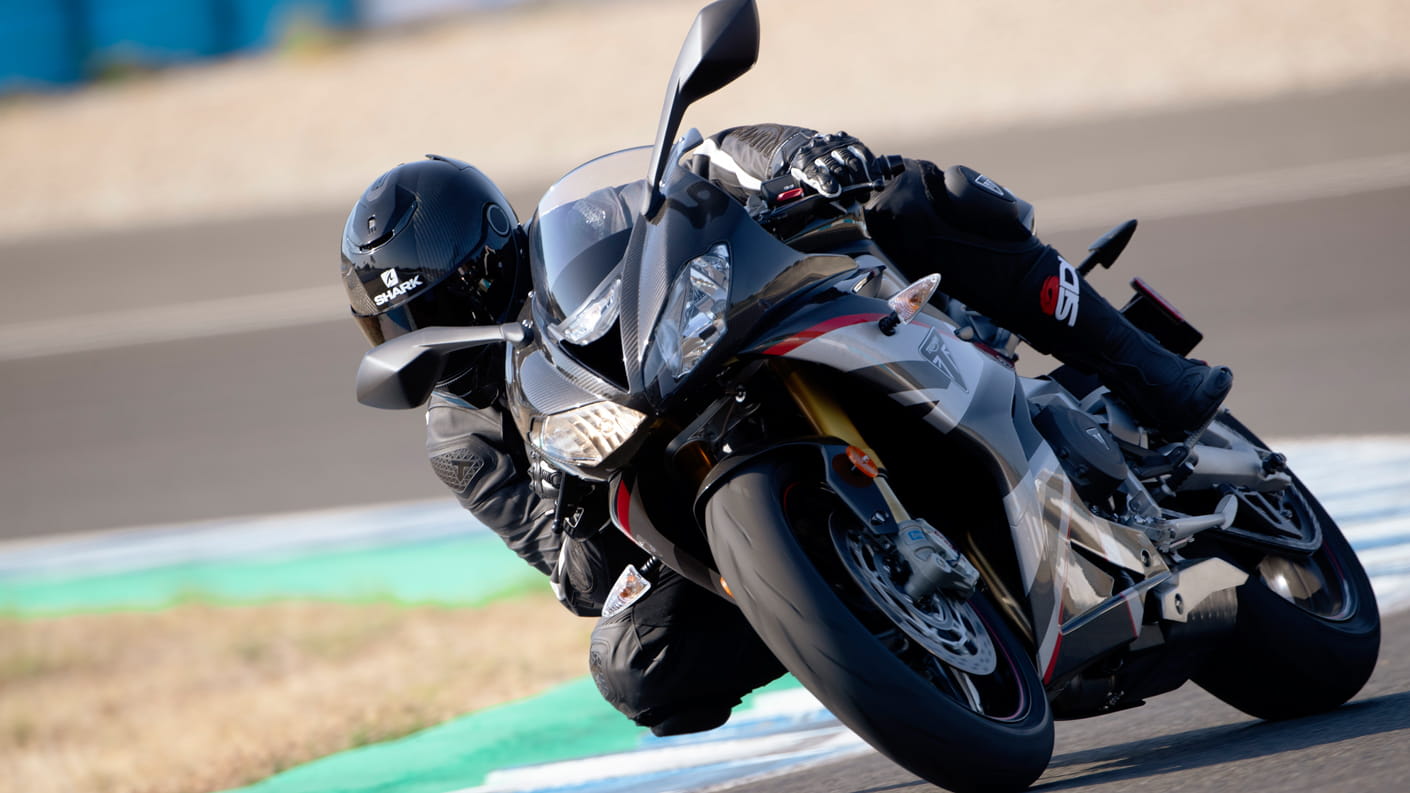 Triumph Daytona Moto2TM 765 motorcycle (USA Edition) racing around a race track at speed