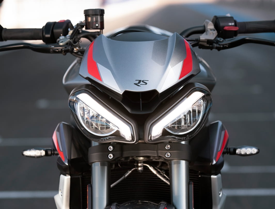 Street Triple RS close up of the aggressive headlights and LED DRL