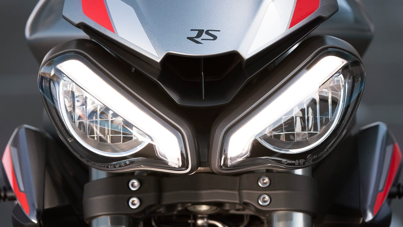 Close-up shot of Street Triple RS's twin LED headlights