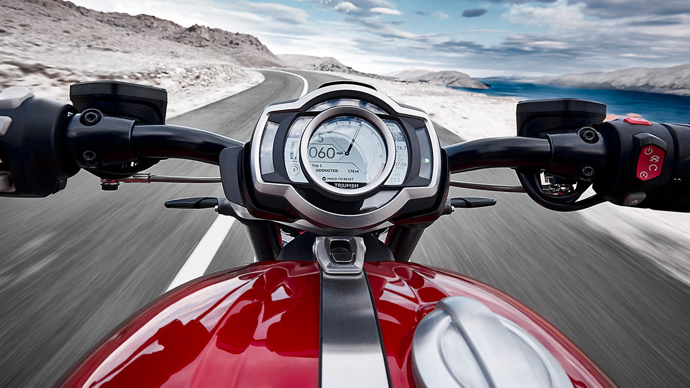 Triumph Rocket 3 point-of-view riding shot displaying accessory fit TFT connectivity system that offers world's first integrated GoPro control system