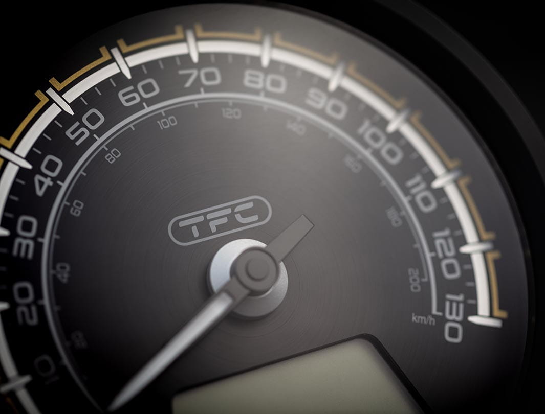 Close-up shot of the Triumph Bobber TFC's beautiful TFC-branded dial face