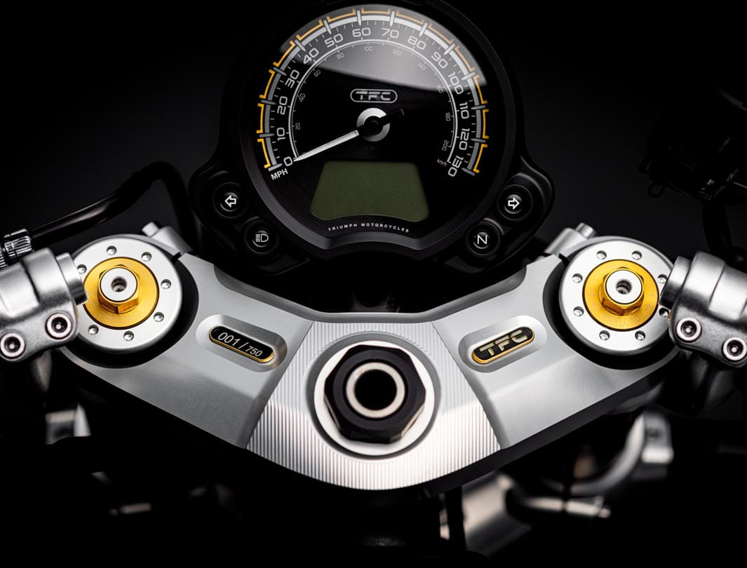 Point-of-view shot of the Triumph Bobber TFC's top yoke and dial