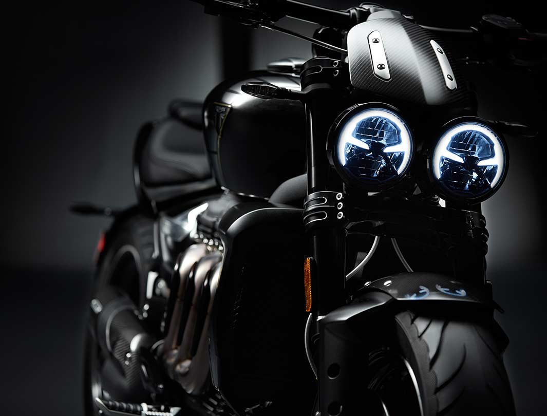 Triumph Rocket 3 TFC front three quarters featuring iconic three header exhaust run and LED DRL headlights