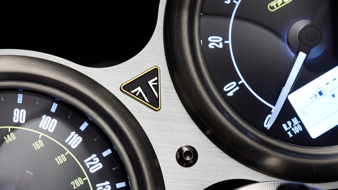 Triumph Thruxton TFC classically styled twin clocks with premium badging and detailing