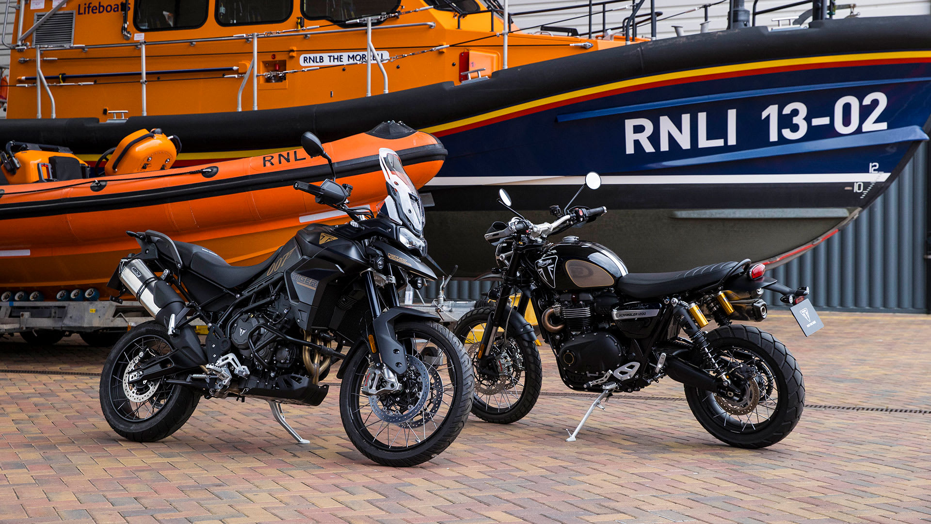 Triumph Scrambler 1200 and Tiger 900 Bond Editions with RNLI