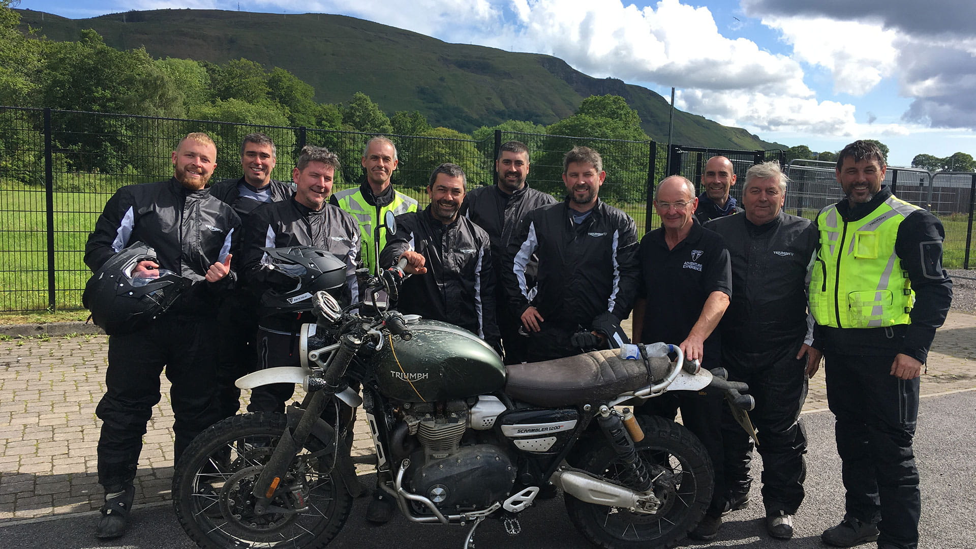 Group shot of the rider participants on the training course for riding the Triumph Scrambler 1200 XC