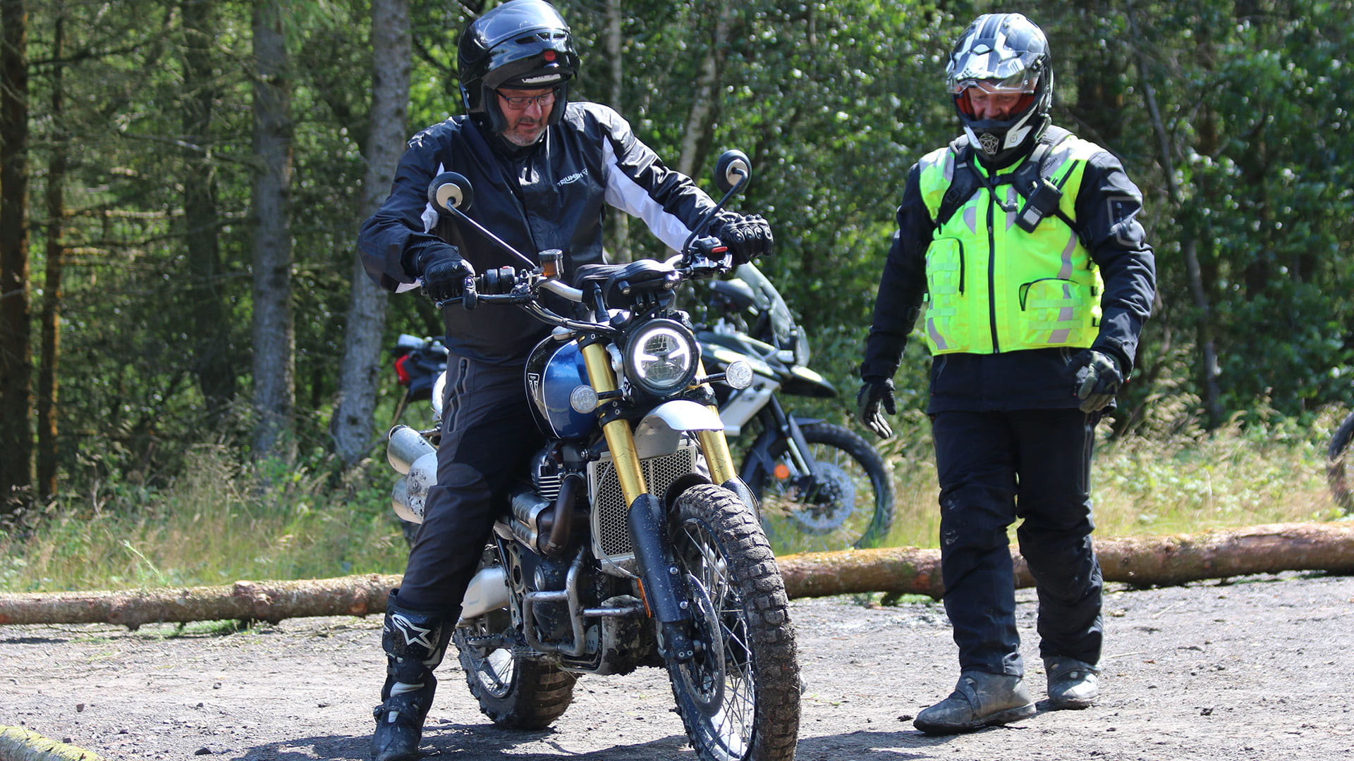 Instructor teaching riding techniques on the Triumph scramber 1200 XE