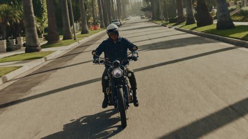 Man riding motorbike wearing Jax Denim Jacket