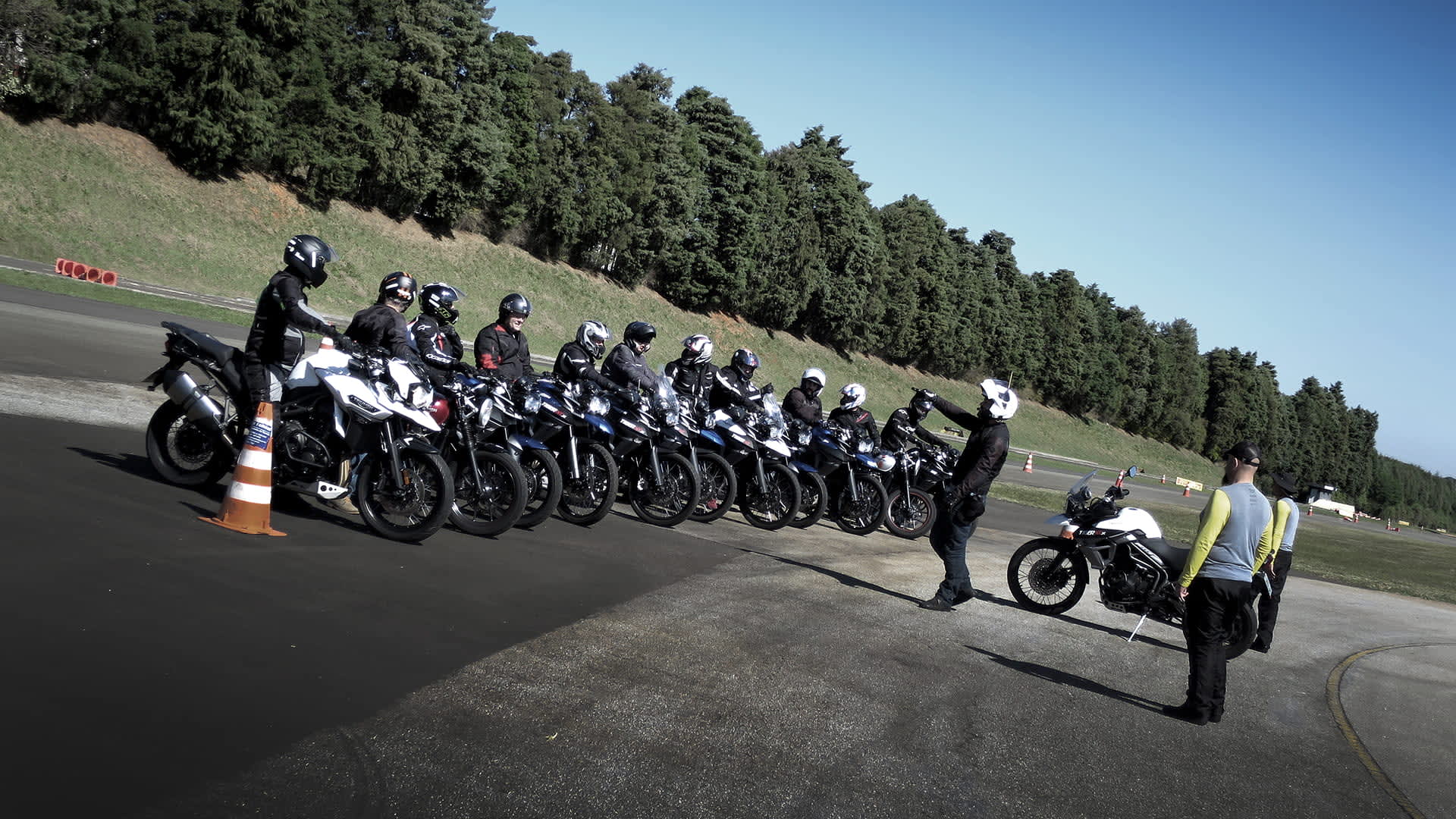Example of the Triumph TRX experience with riders lined up with instructor in front.