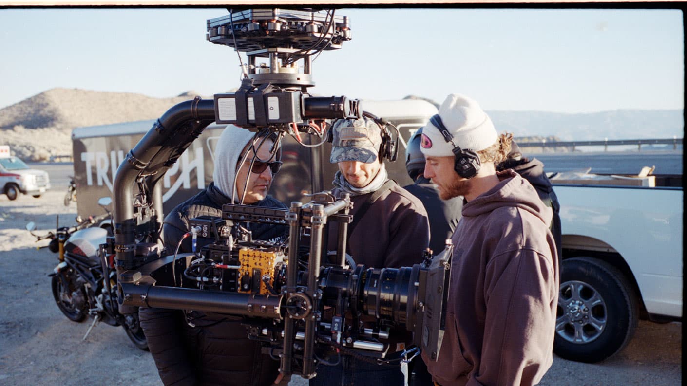 Camera operators looking at the equipment