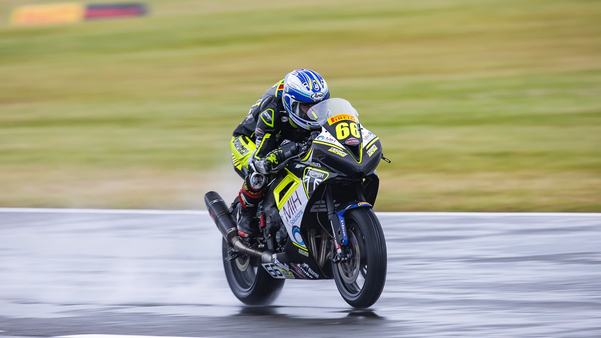 Triumph Daytona 660 race bike racing in the wet