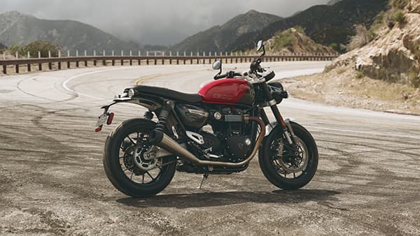 Triumph Speed Twin 1200 in layby on mountain road