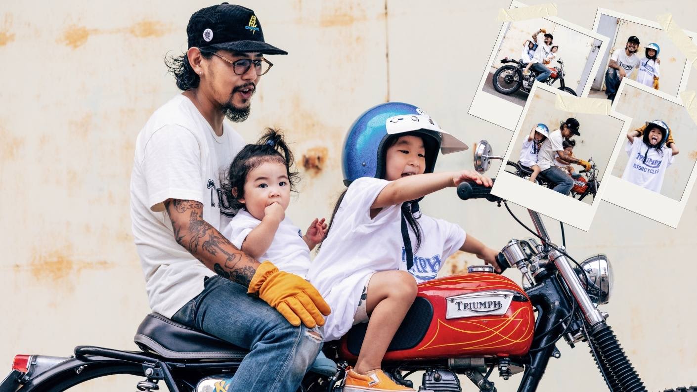 Satoshi with children on his Triumph motorcycle
