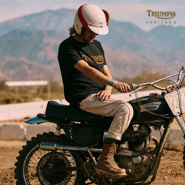 Man on Triumph wearing Fork Seal Logo Tee