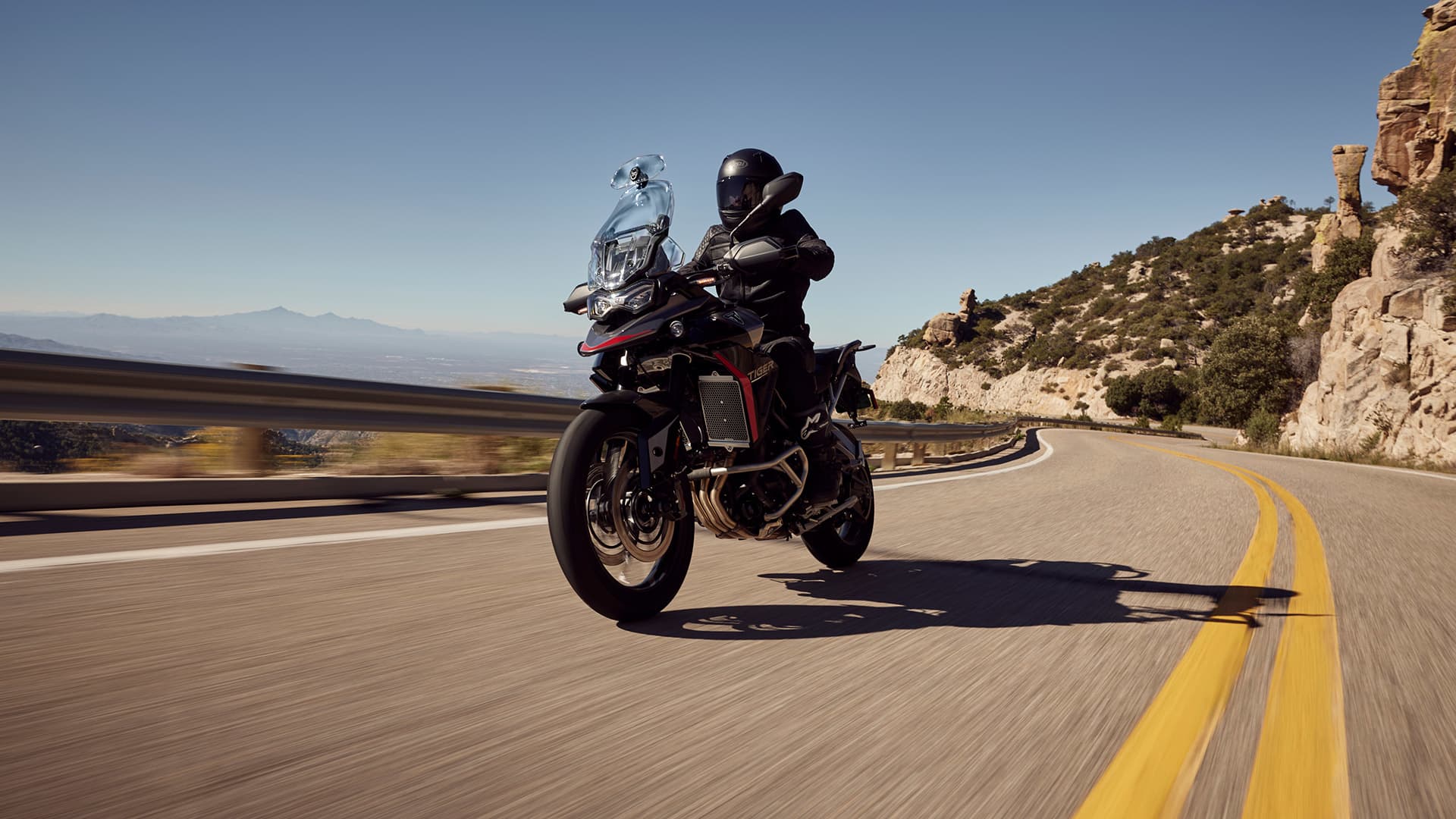Riding shot of a Triumph Tiger 900 GT Pro